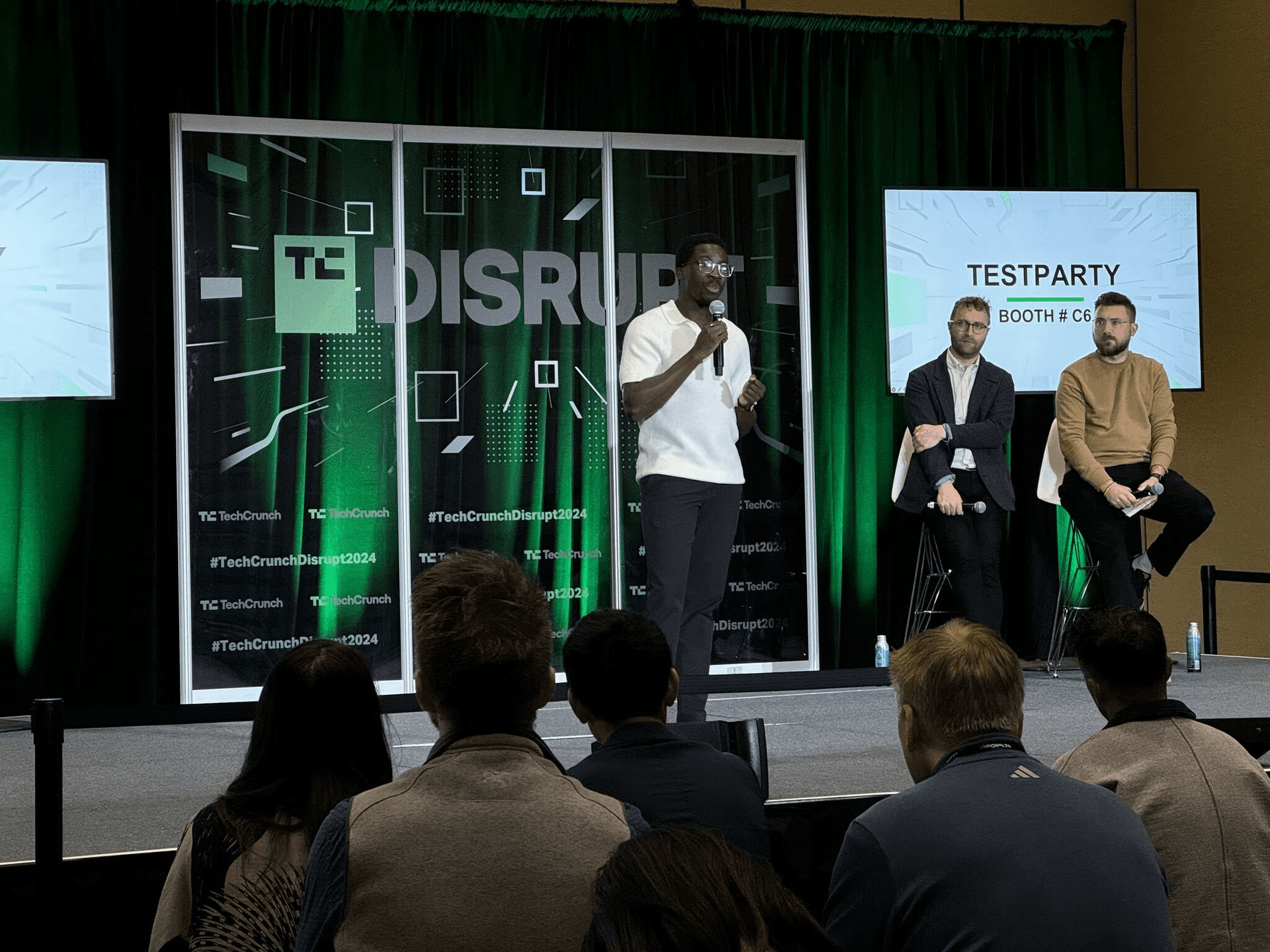 Michael Bervell giving a presentation at TechCrunch Disrupt